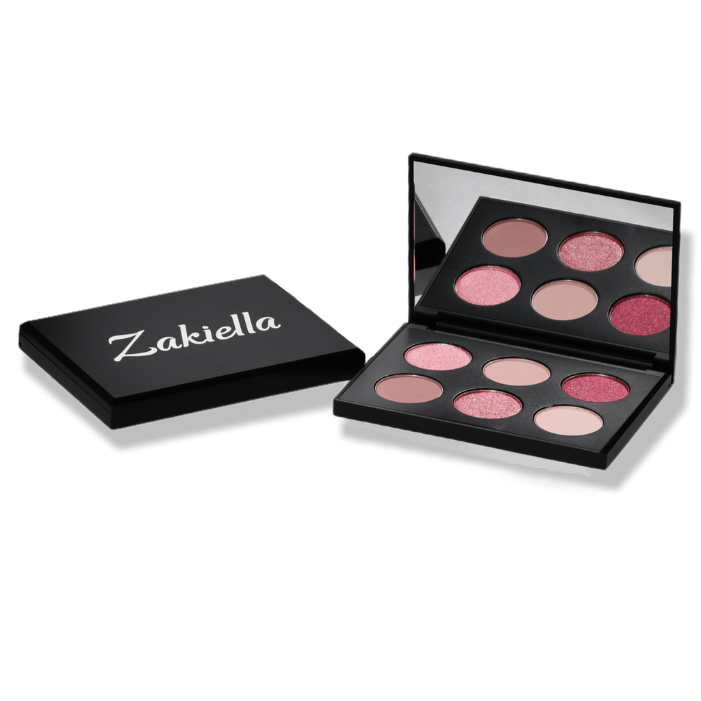 Petals Eyeshadow Palette Eyeshadow Palette shown open with a closed one beside it showing the Zakiella logo. The eyeshadows are a mix of pink metallic shades and pinky brown matte neutral shades.