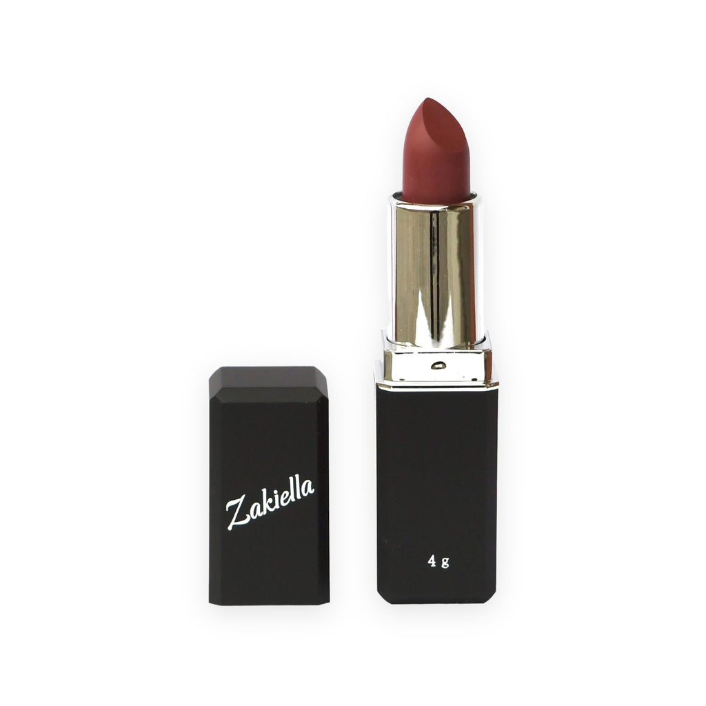 Deep warm-toned red matte lipstick by Zakiella shown open in the shade Powerful